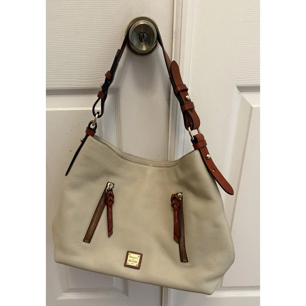 Dooney & Bourke Hobo Bag Women Large Cream Pebbled Leather Tan Trim Logo Plaque